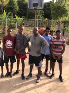 JoJo with youth on basketball court_May 2020