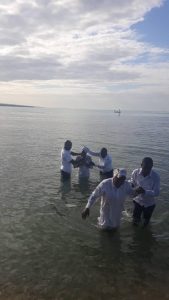 Baptism in large body of water