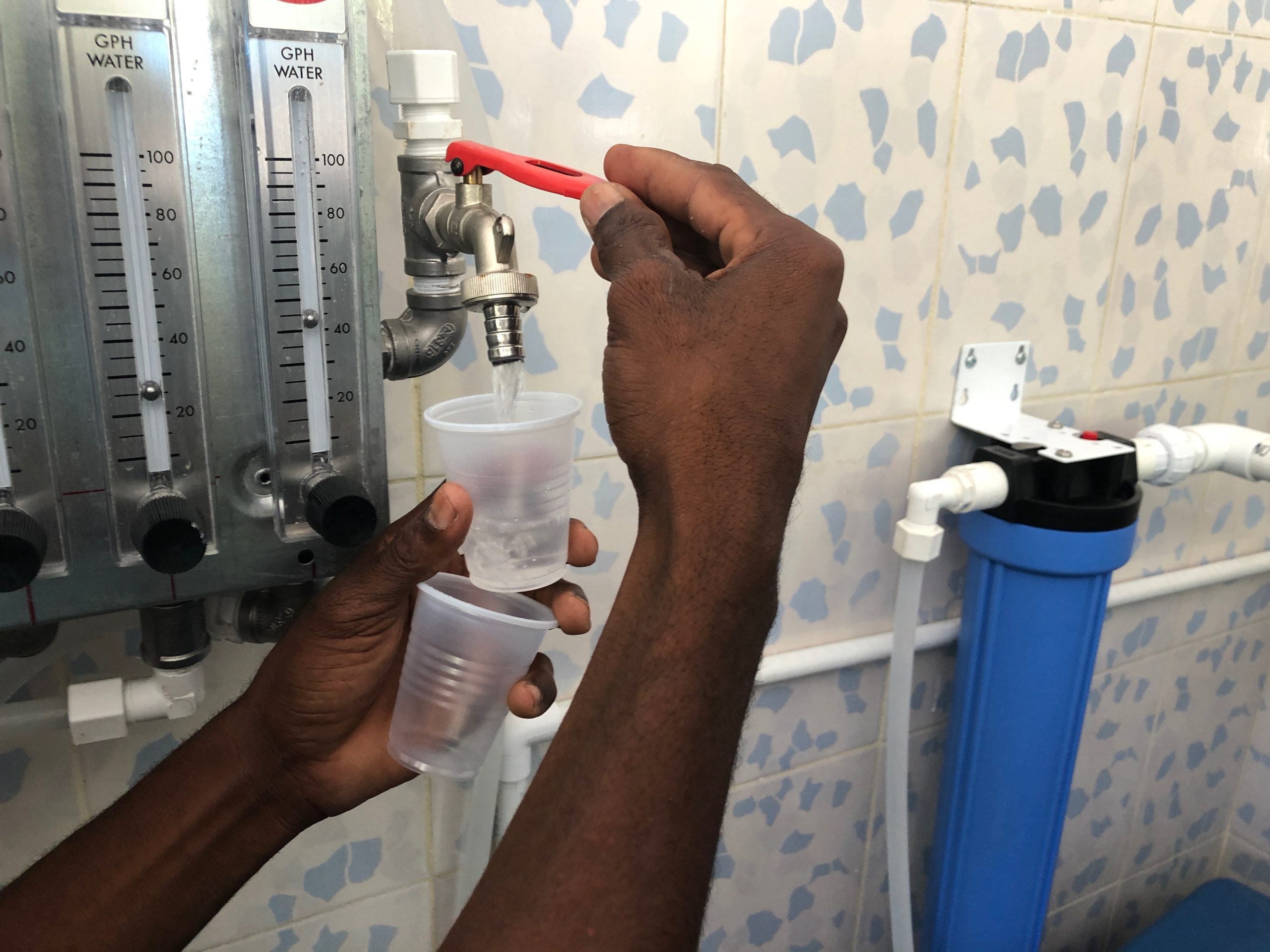 Water cup being filled